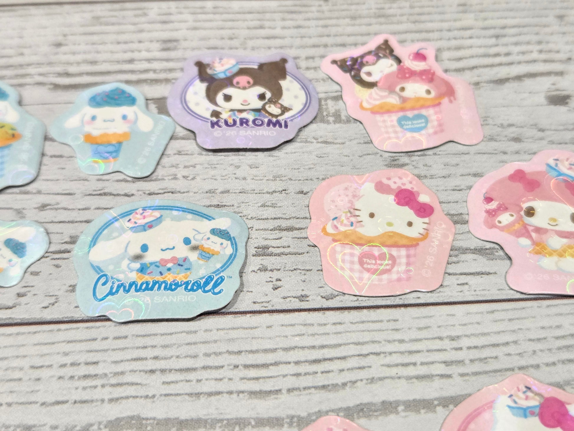 Mixed ice cream character stickers including Kuromi, Cinnamoroll, and Hello Kitty