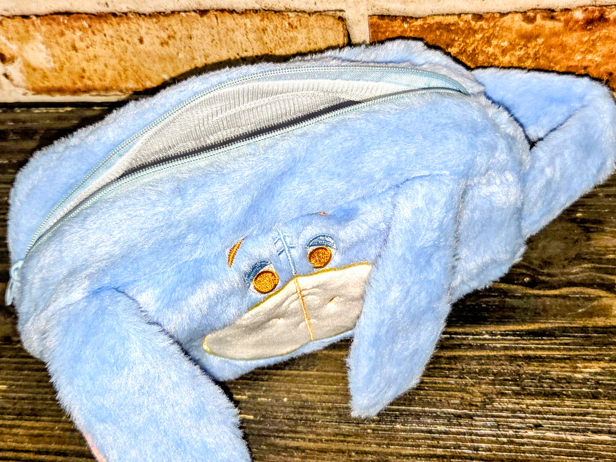 Eeyore plush zipper pouch with zipper opening and embroidered muzzle