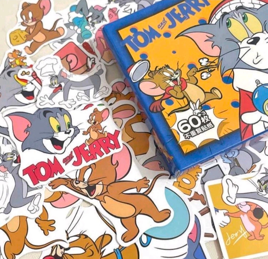 Tom and Jerry sticker pack box at an angle with character stickers scattered