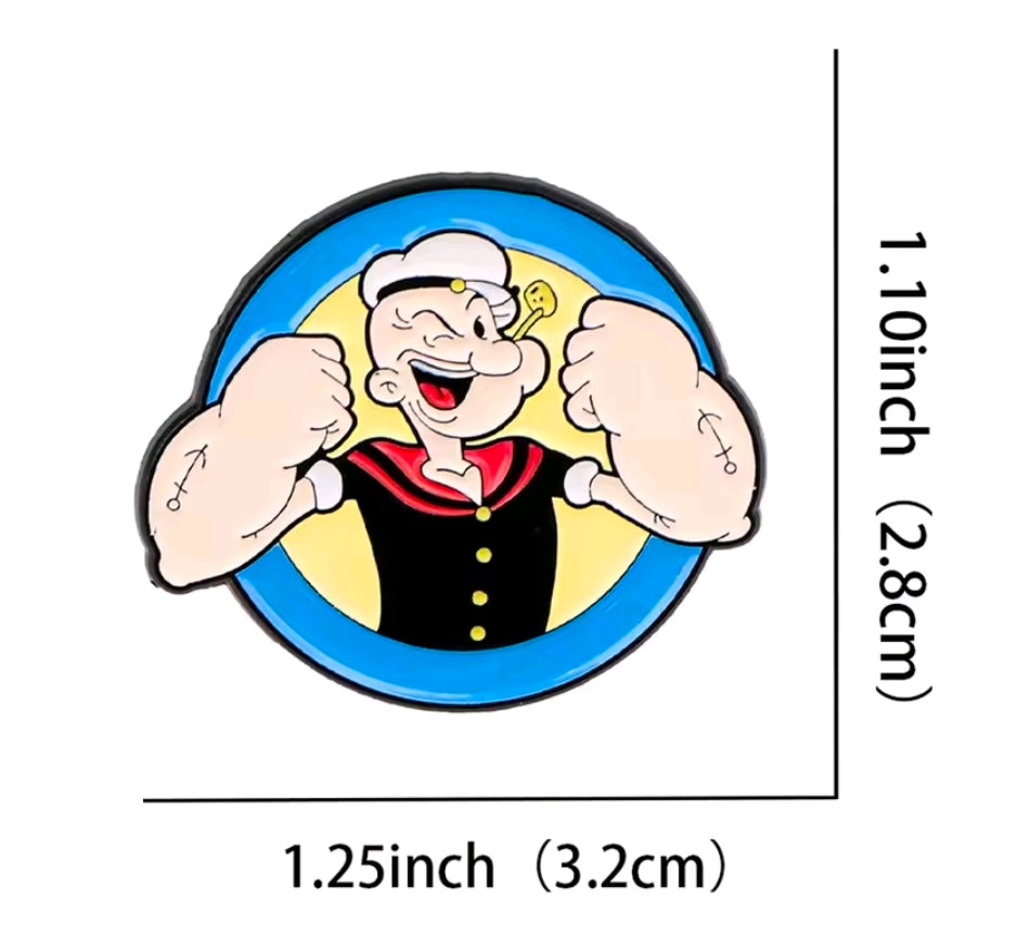 Cartoon sailor face enamel lapel pin, blue circle, flexed arms, red scarf.