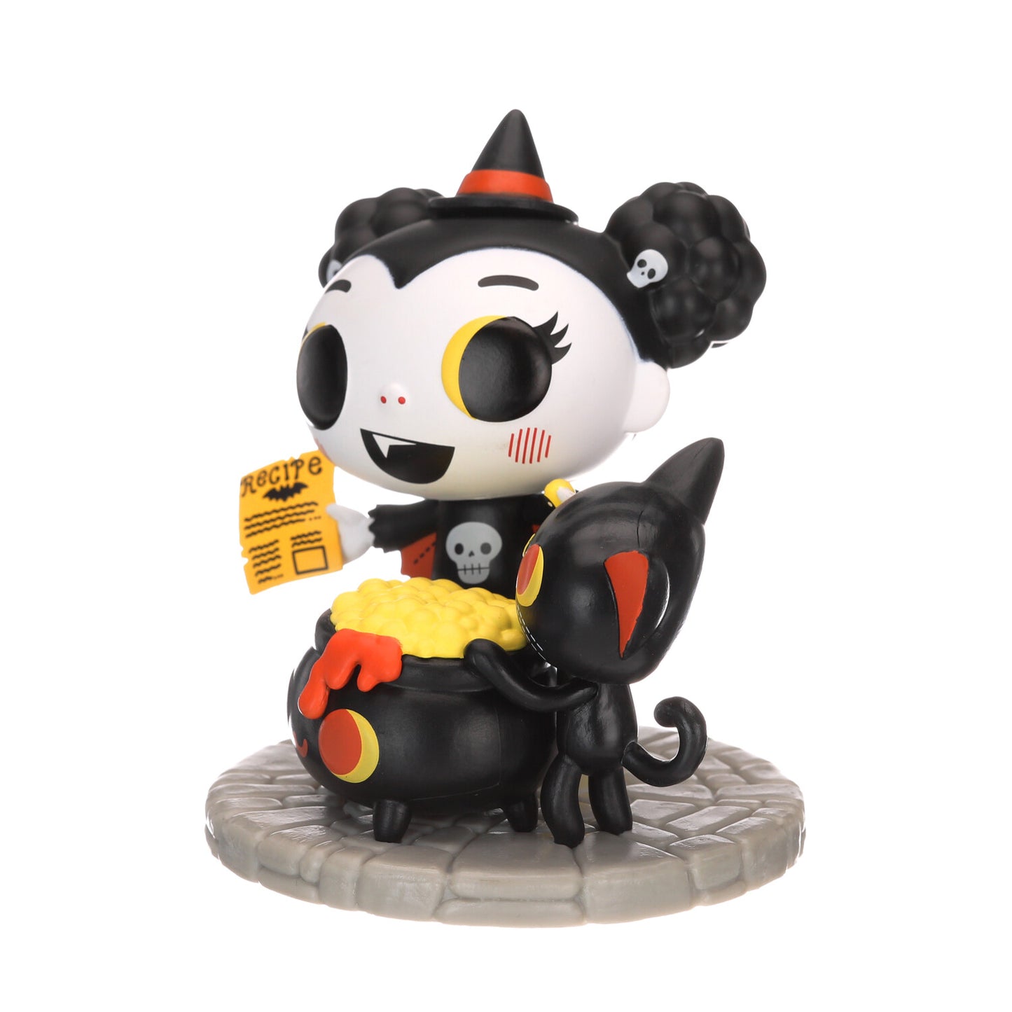 Black-and-white vinyl character figure with orange cone hat holding yellow card, on base