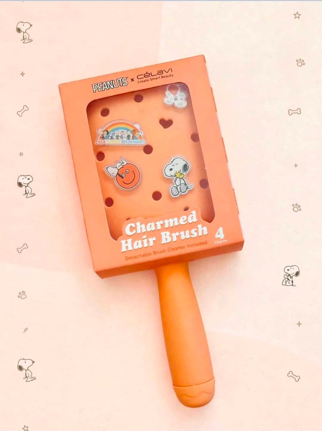 Peach paddle hair brush with Peanuts charm characters and heart motifs, boxed set
