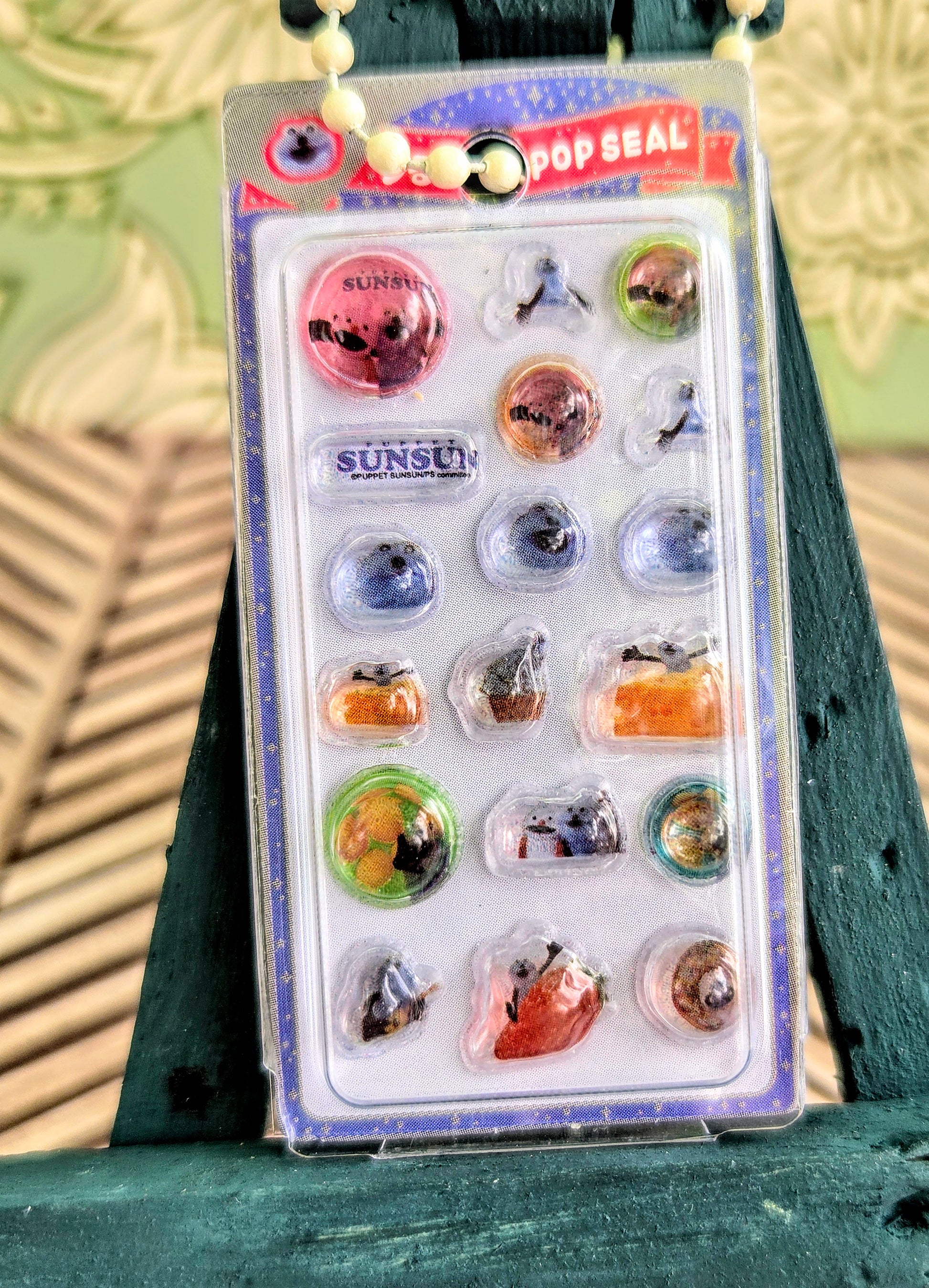 Hanging clear blister sticker keychain pack with small colorful animal stickers
