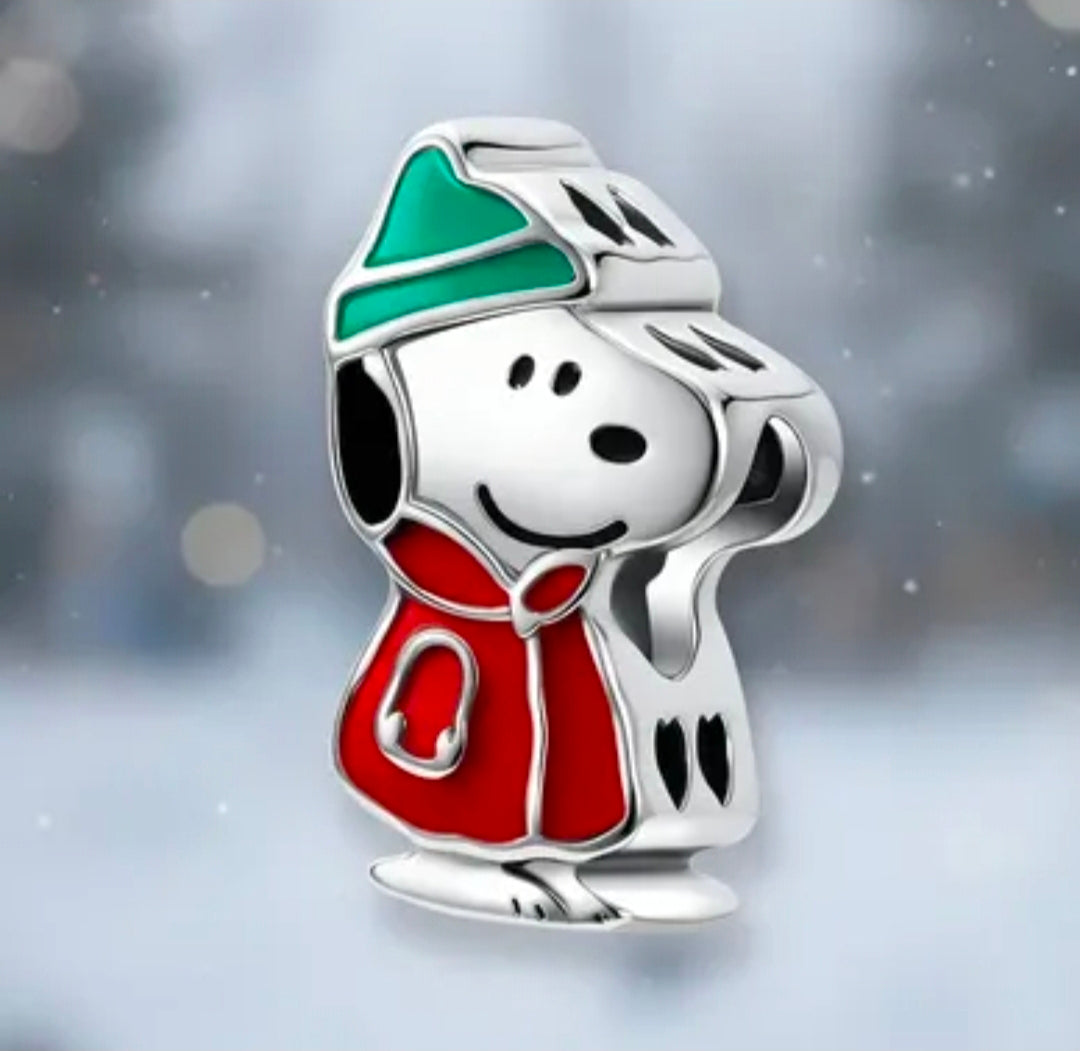 Close-up: Sterling silver Snoopy winter puffer coat charm with green hat and red coat enamel