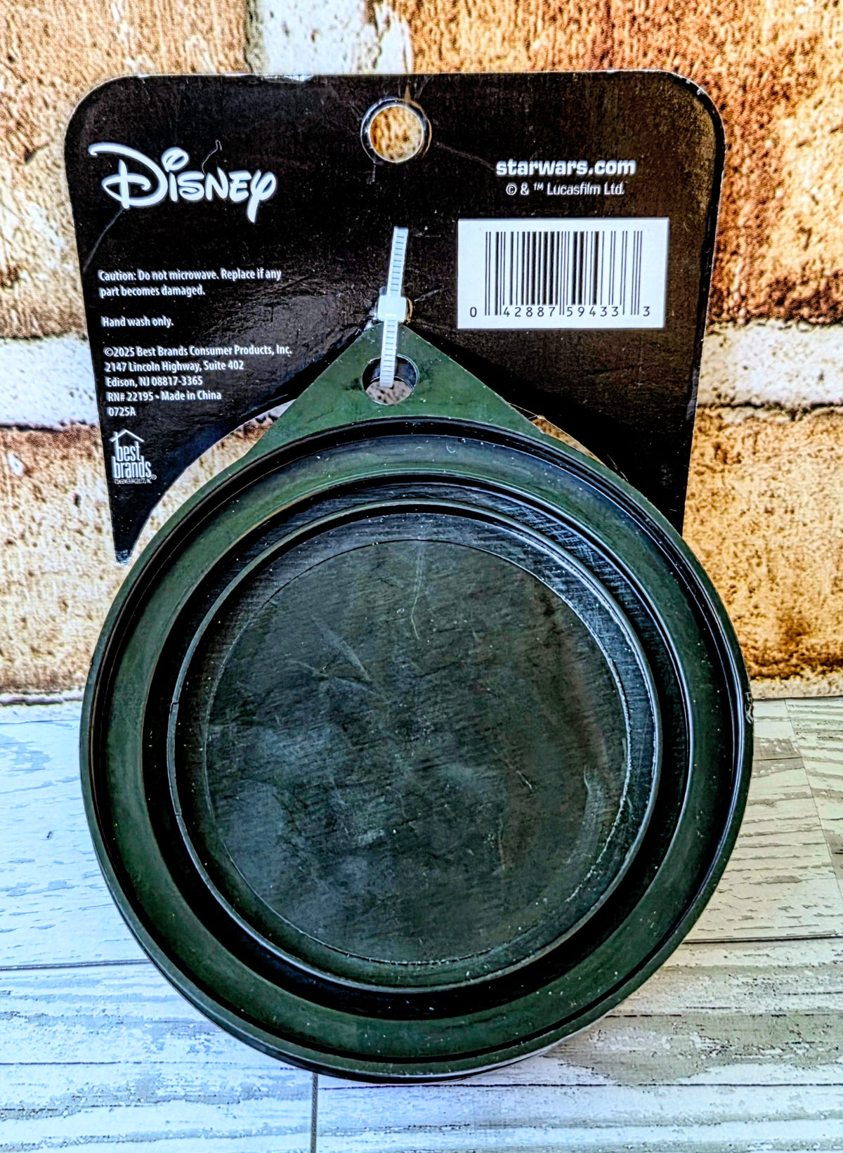 Round Star Wars pet bowl, dark green plastic with underside label.