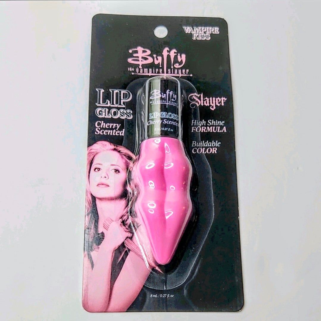 Pink high-shine lip gloss in blister pack, cherry scented