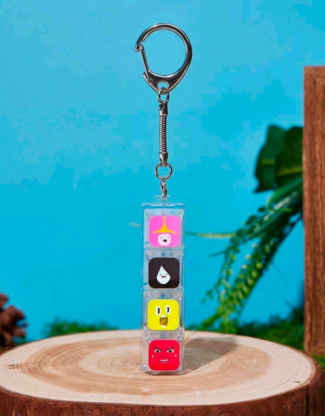 Four-cube click fidget keychain with character face panels