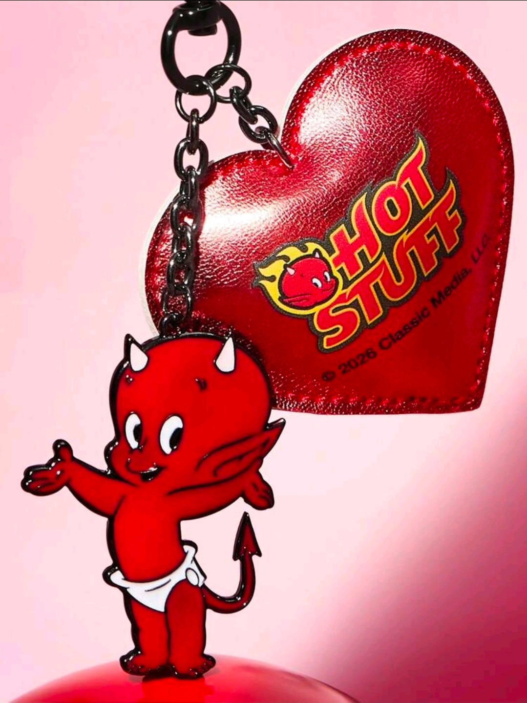 Red heart keychain with 'Hot Stuff' logo, metal chain and red devil mascot