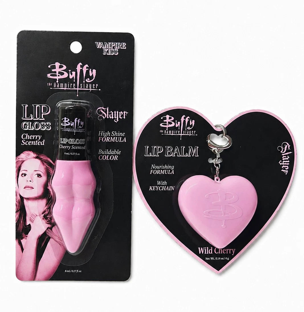 Cherry lip gloss bottle and Wild Cherry lip balm heart keychain displayed