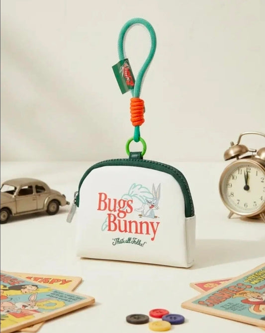 White Bugs Bunny coin purse keychain pouch with green trim, zipper and carrot-orange cord