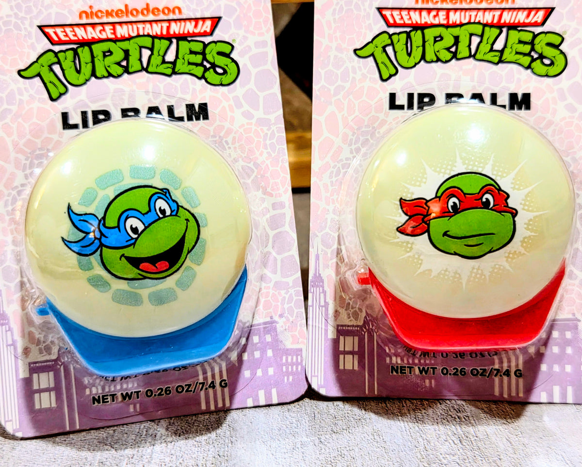 Teenage Mutant Ninja Turtles lip balm in blister pack, blue base, turtle graphic