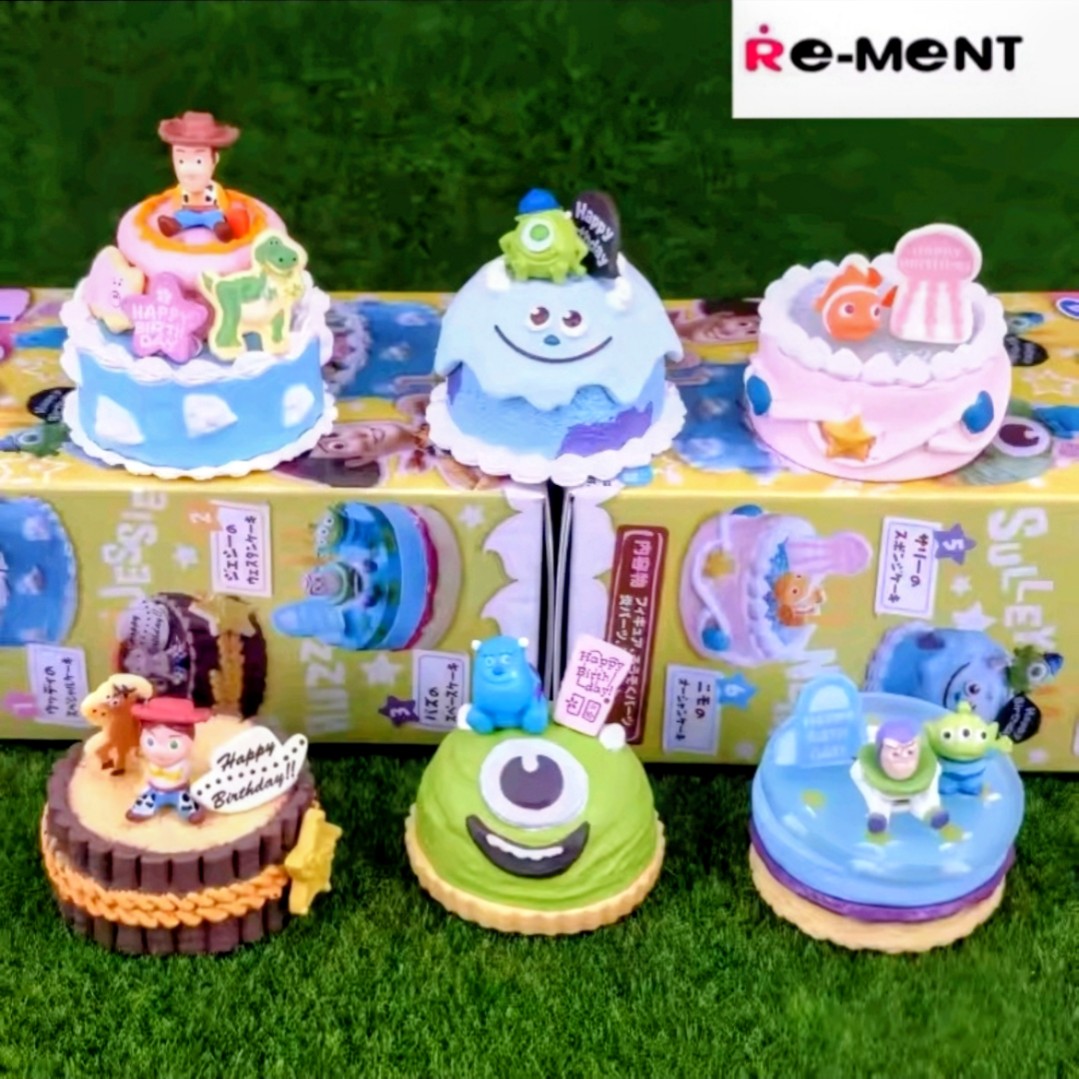 Six birthday cake miniature figures display with characters and candles