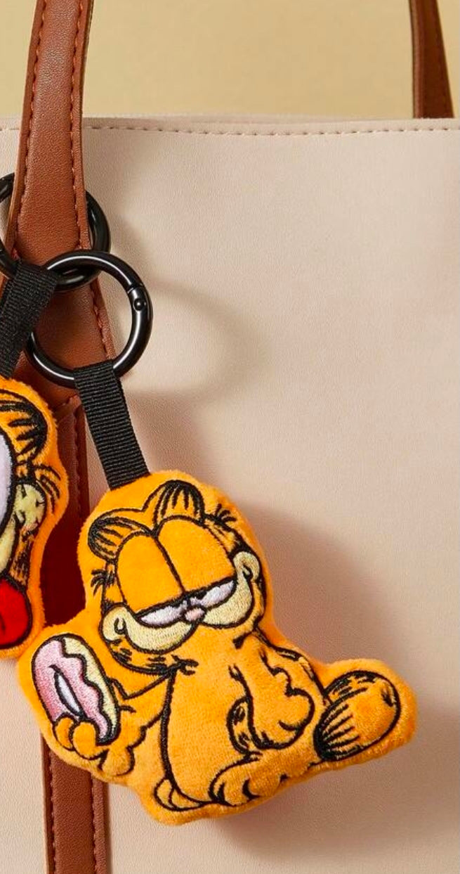 Mini plush keychain of orange Garfield with black strap and metal key ring
