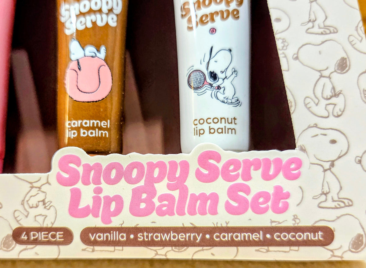 Snoopy Serve lip balm set showing caramel and coconut tubes in box