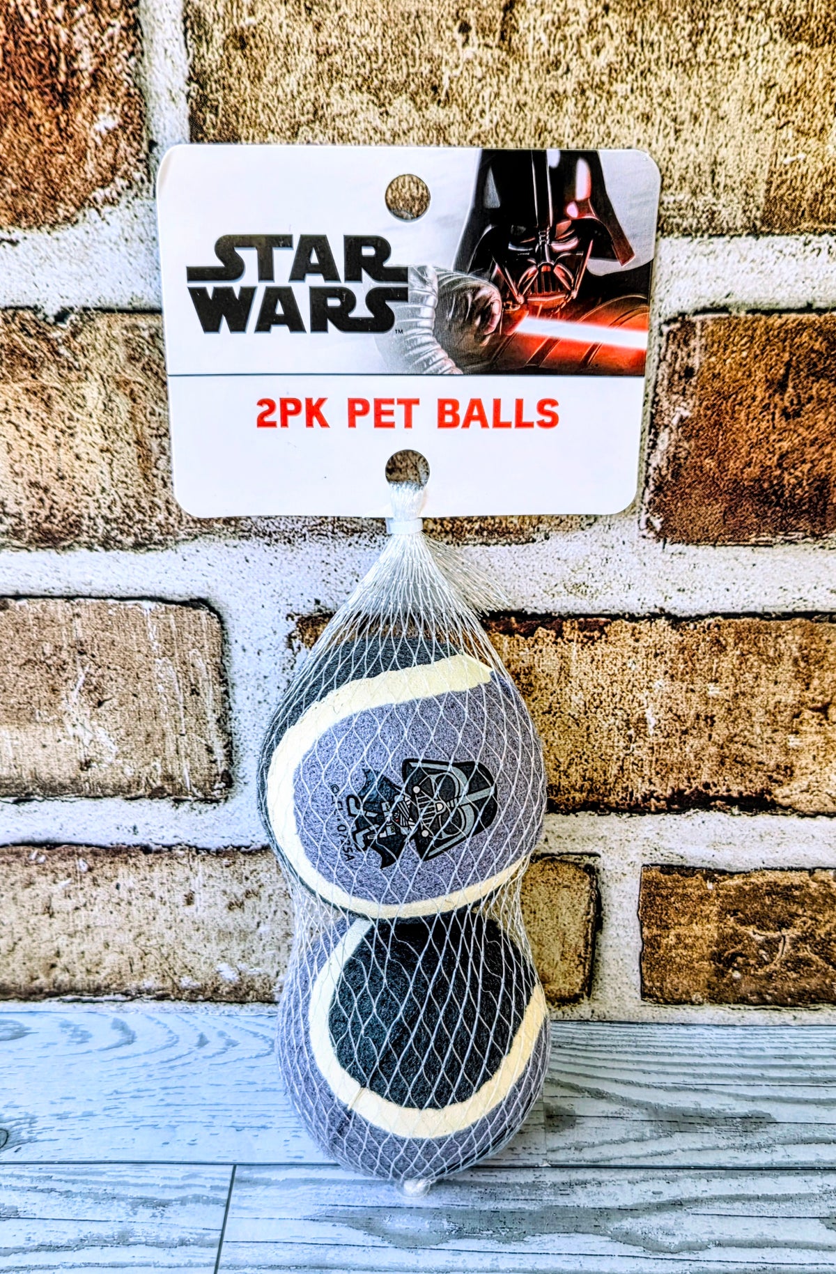 Star Wars 2-pack pet balls, gray mesh with Darth Vader print and yellow trim.