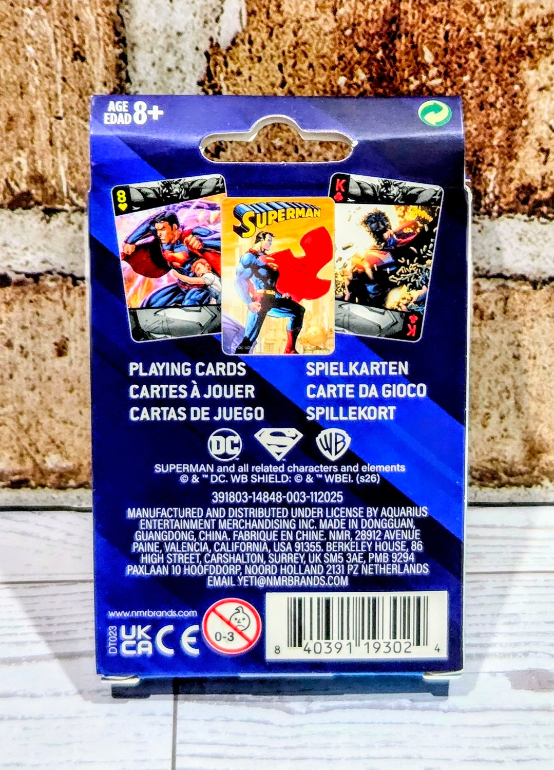 Superman DC Comics playing card deck back with age 8+ and game info text