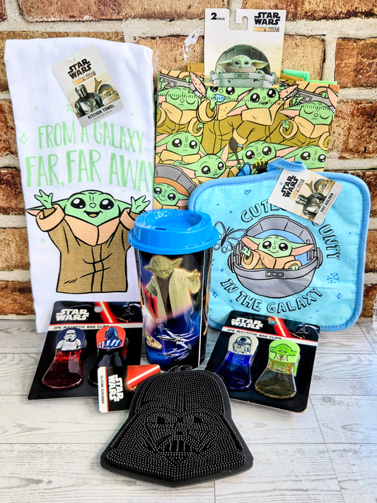 Star Wars Grogu gift set with white graphic T-shirt, blue pouch, tumbler, socks, black cap