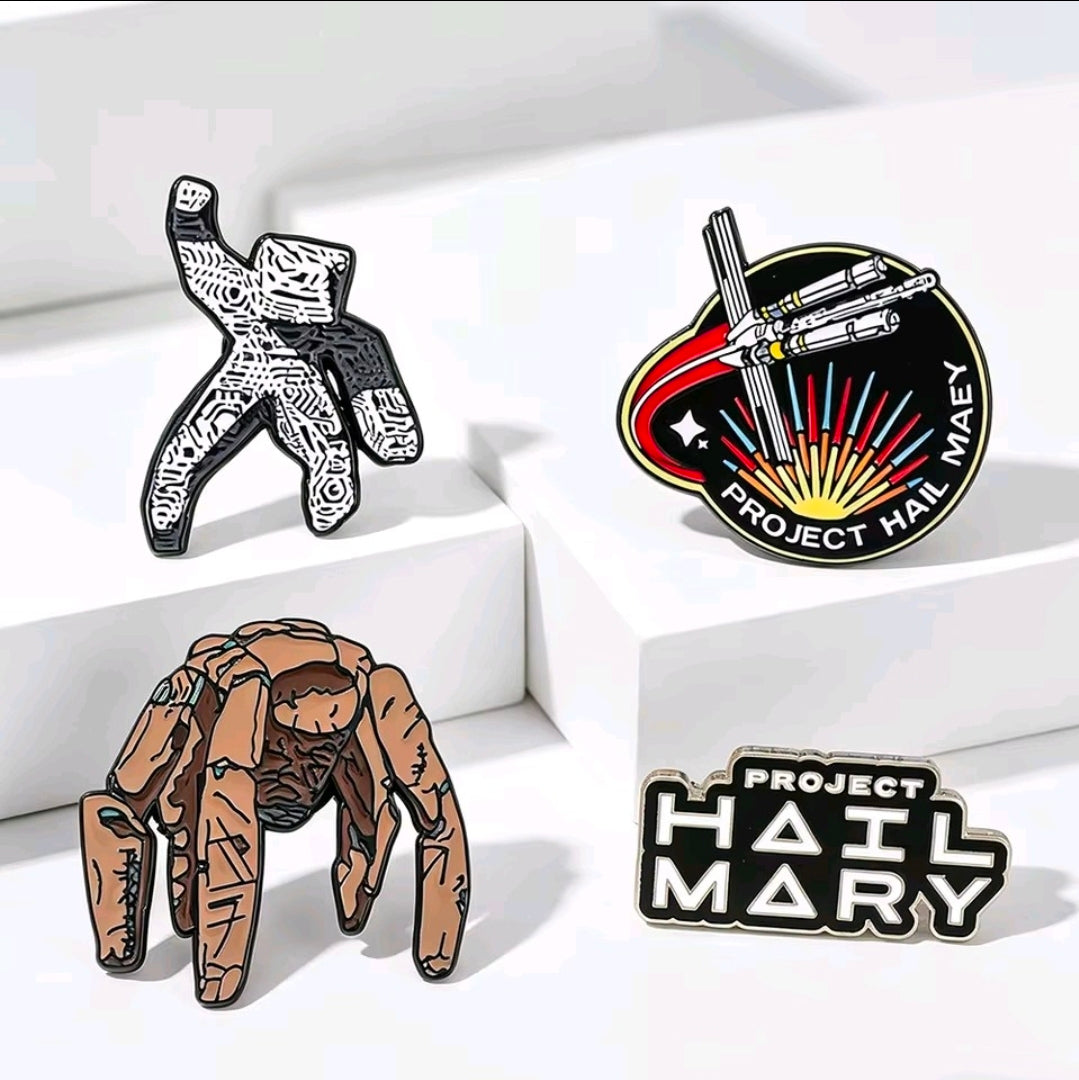 4-piece enamel pin set featuring two character figures, a chest logo, and a ship badge