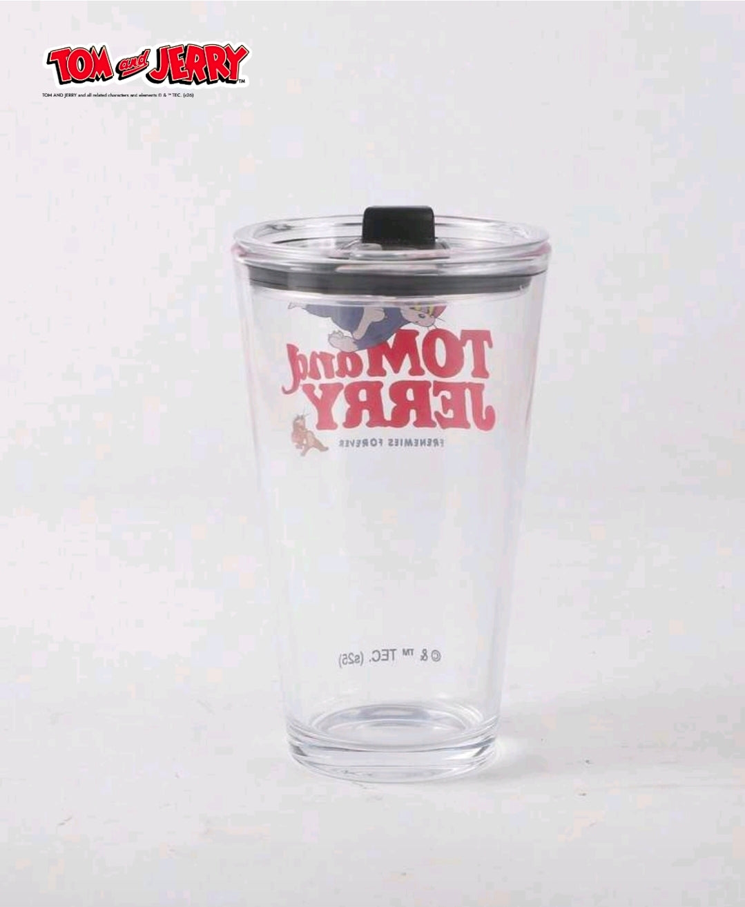 Clear plastic tumbler with black lid and Tom and Jerry graphic, 450ml