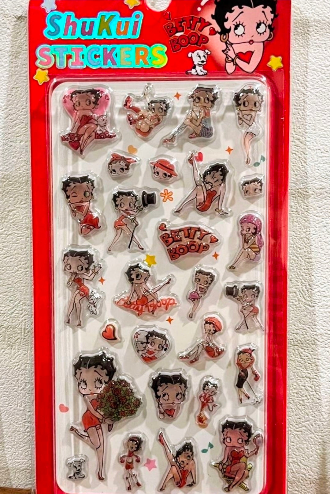 Betty Boop sticker sheet with multiple cartoon characters in red outfits