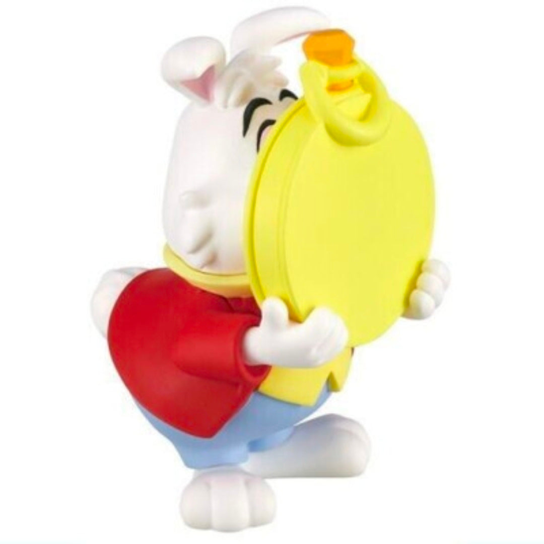 White rabbit gashapon figure with red pants, smiling and holding a yellow bag