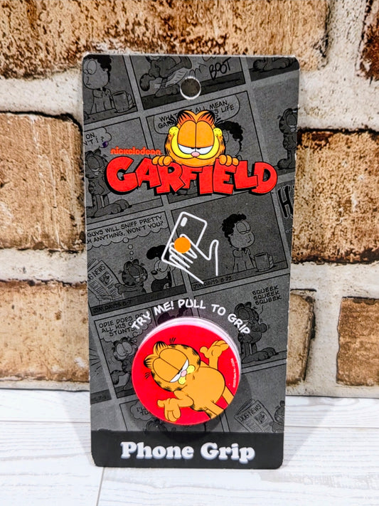 Garfield phone grip holder with black packaging and Garfield graphic, pop socket front.