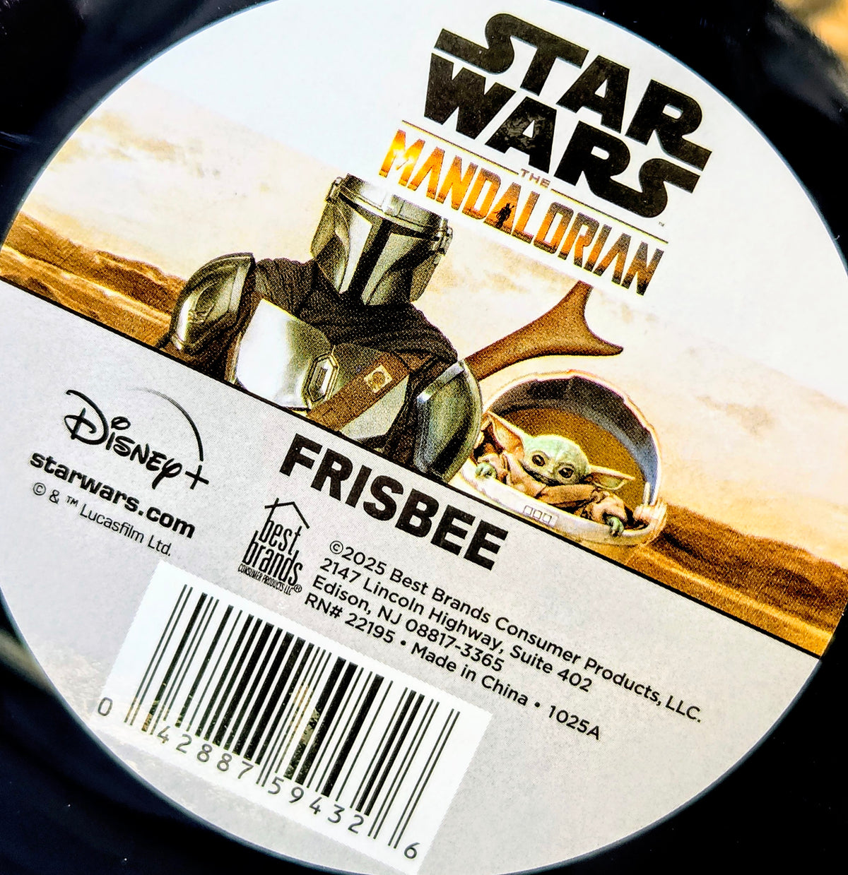 Round Frisbee with Mandalorian artwork, "FRISBEE" text, and Star Wars branding