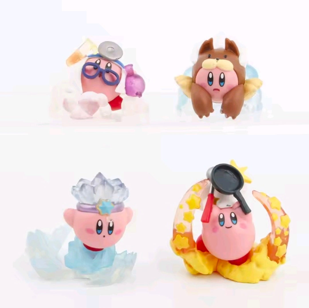 Set of four Kirby gashapon figures, including pink, brown, blue, and yellow themed versions