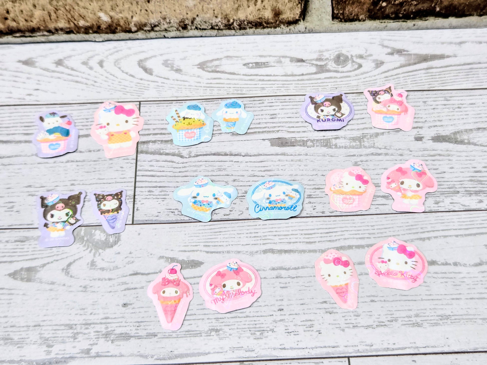 Assorted ice cream character sticker set with Hello Kitty, Kuromi, and Cinnamoroll