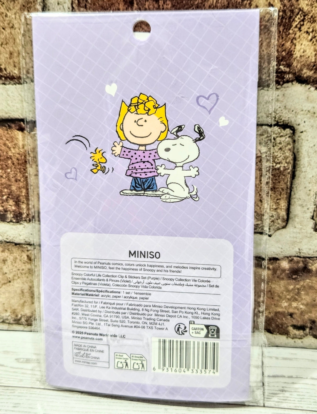 Stationery sticker sheet with Snoopy line art, hearts, and MINISO branding