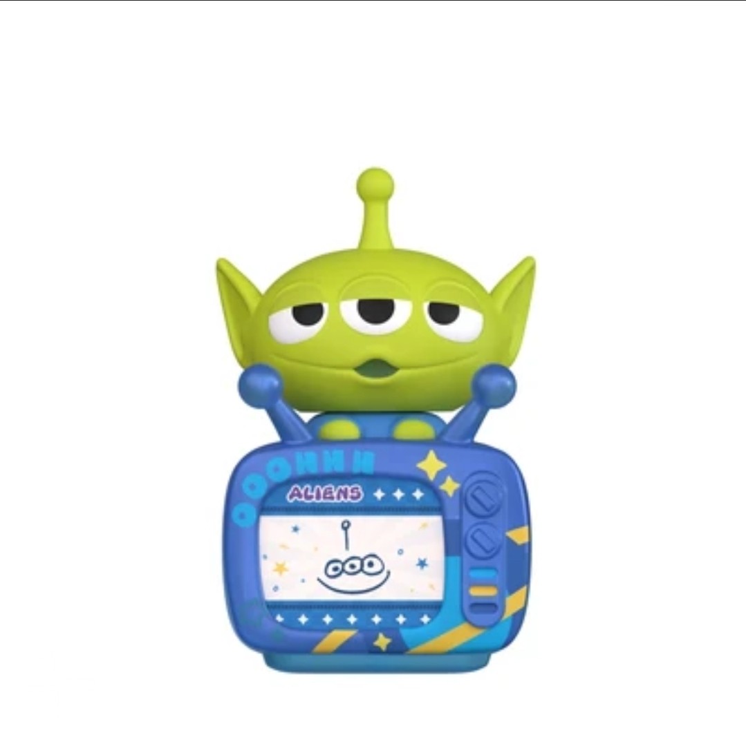 Green Alien character TV figure with blue casing and antenna details