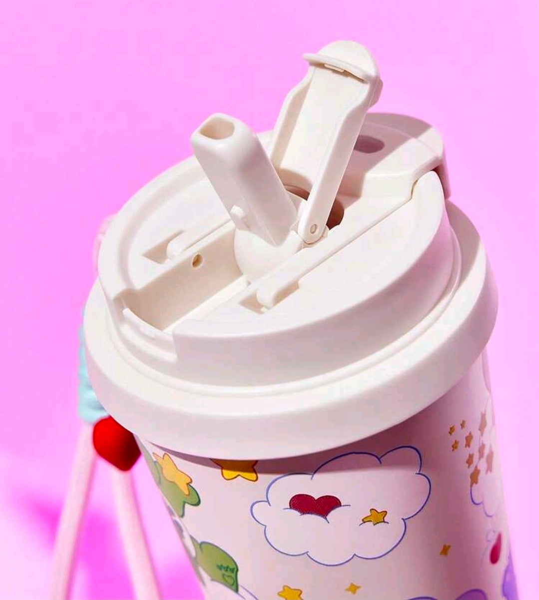 White insulated tumbler with open lid showing drinking opening and latch