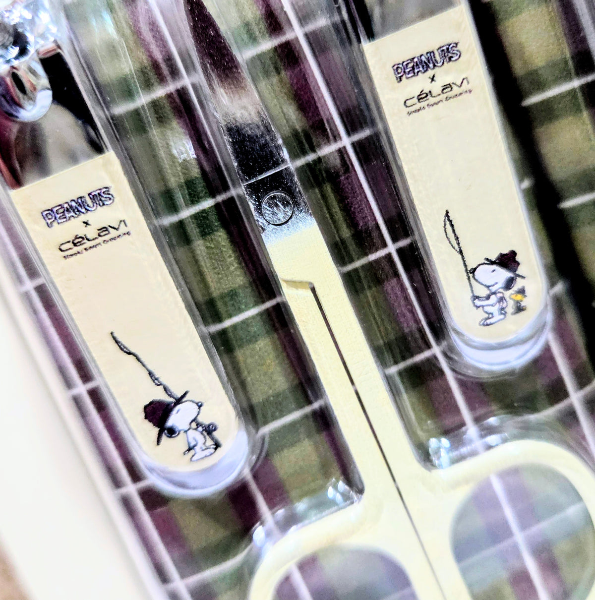 Close-up of blister tray showing nail file and tools with cartoon graphics