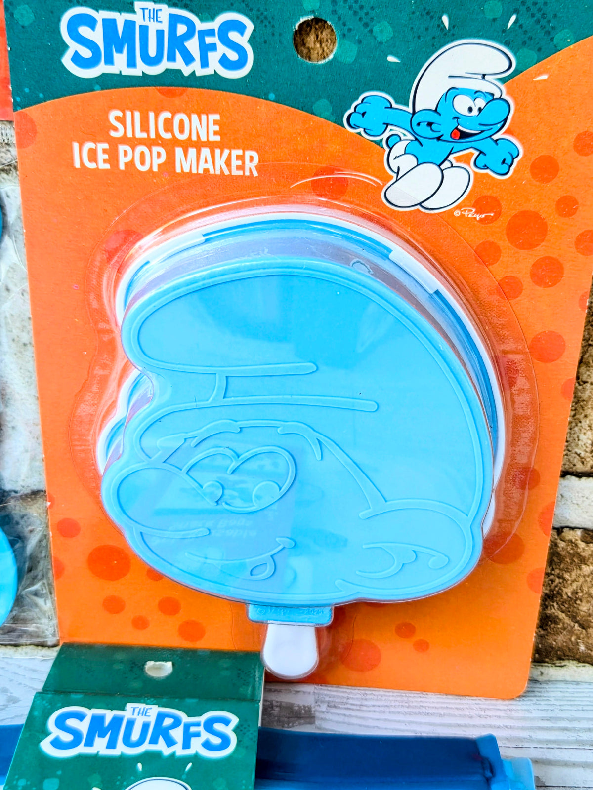 Smurfs silicone ice pop maker mold with character design, blue