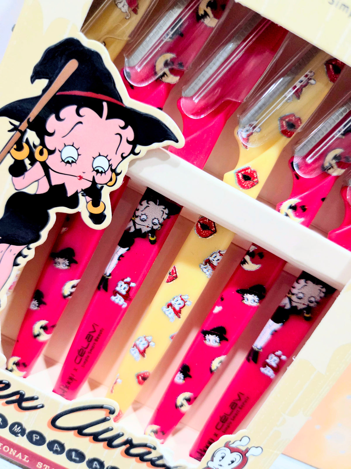 Betty Boop dermaplane and dual sheet mask gift set with pink and yellow handles