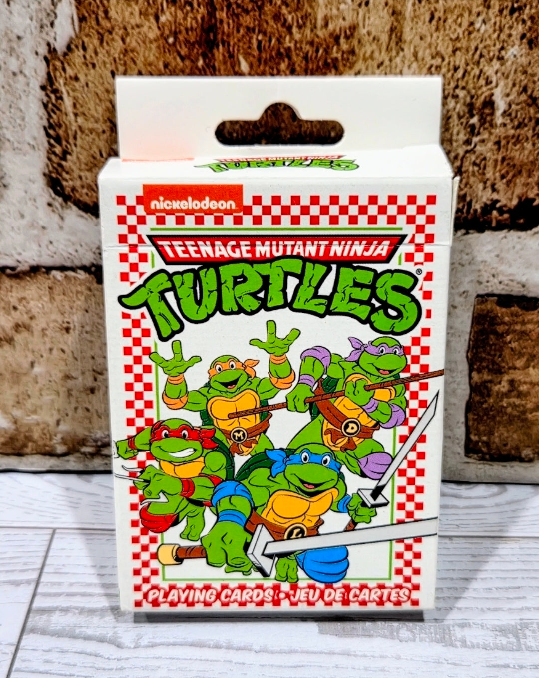 Teenage Mutant Ninja Turtles playing cards deck in red checkered box