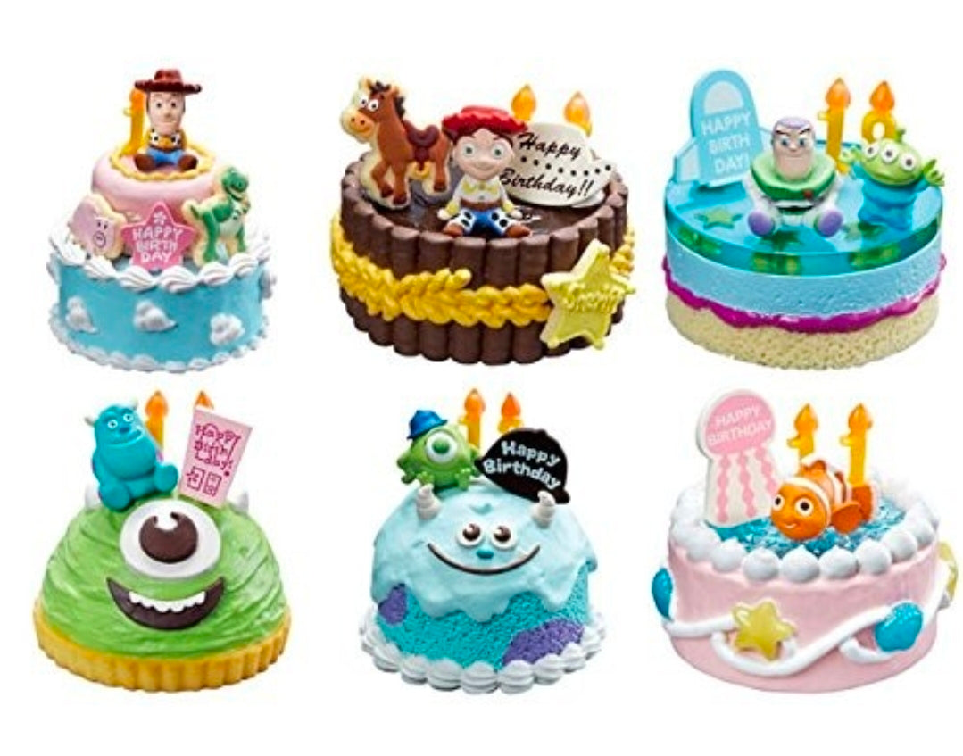 Set of six colorful birthday cake miniature figures