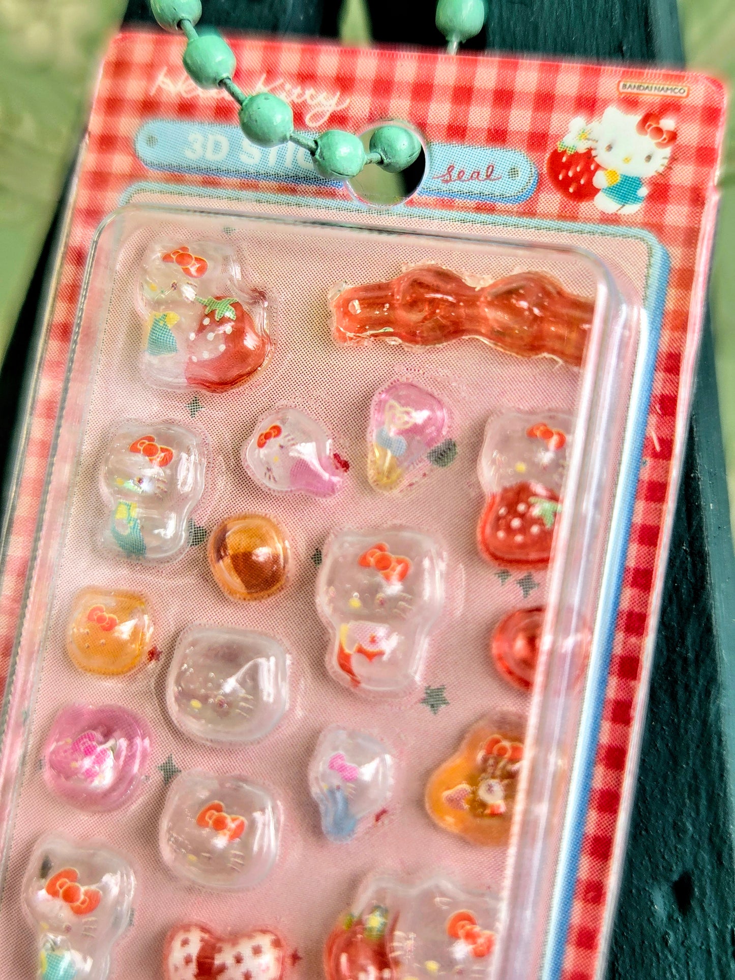 Hello Kitty 3D sticker blister pack with red-orange character stickers and keychain tag