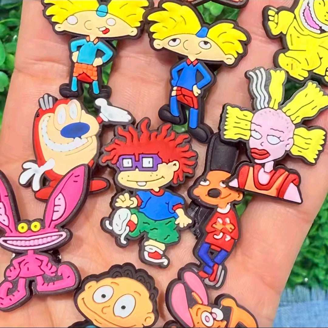 13-piece PVC cartoon shoe bag charm set showing assorted character figures