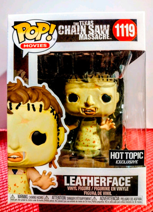 Vinyl figure box front with Leatherface character and Hot Topic exclusive badge