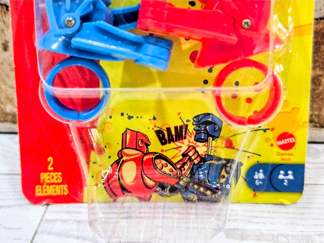Close-up blister pack with blue and red robot finger rings