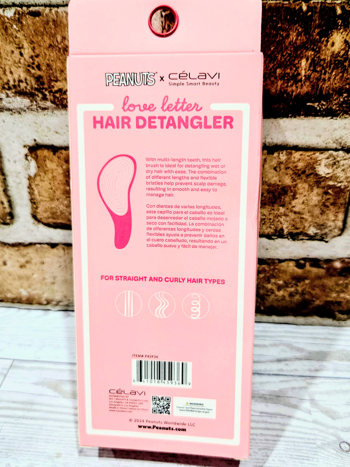Hair detangler gift box with pink brush and Snoopy-themed branding