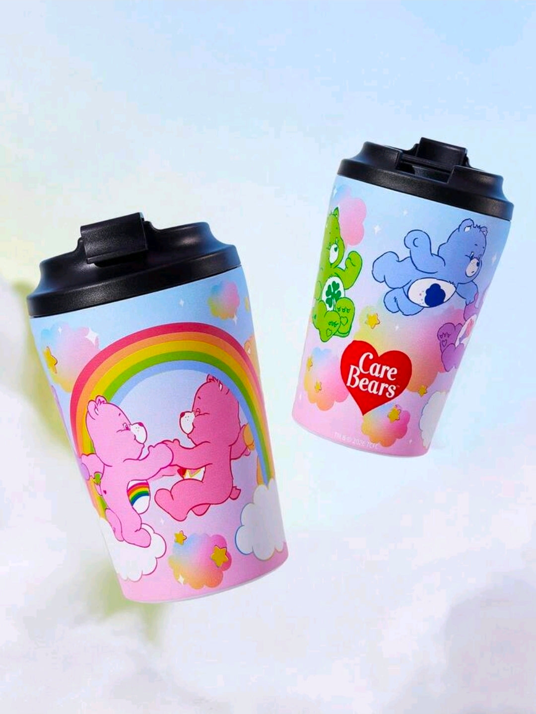 Set of 2 Care Bears rainbow tumblers with black lids, pink bear and rainbow artwork