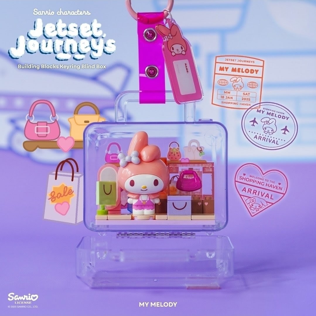 Pink keyring building block keychain with clear luggage case and character figurine