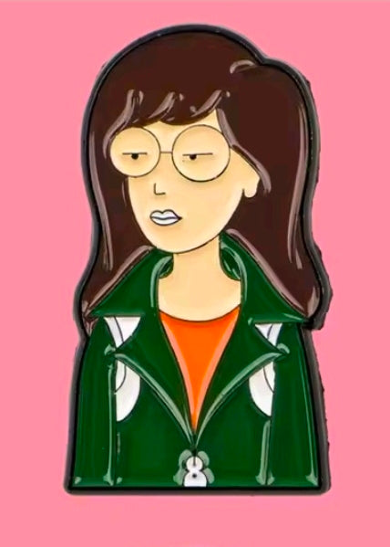 Enamel character pin of Jane in a green jacket with glasses and brown hair.
