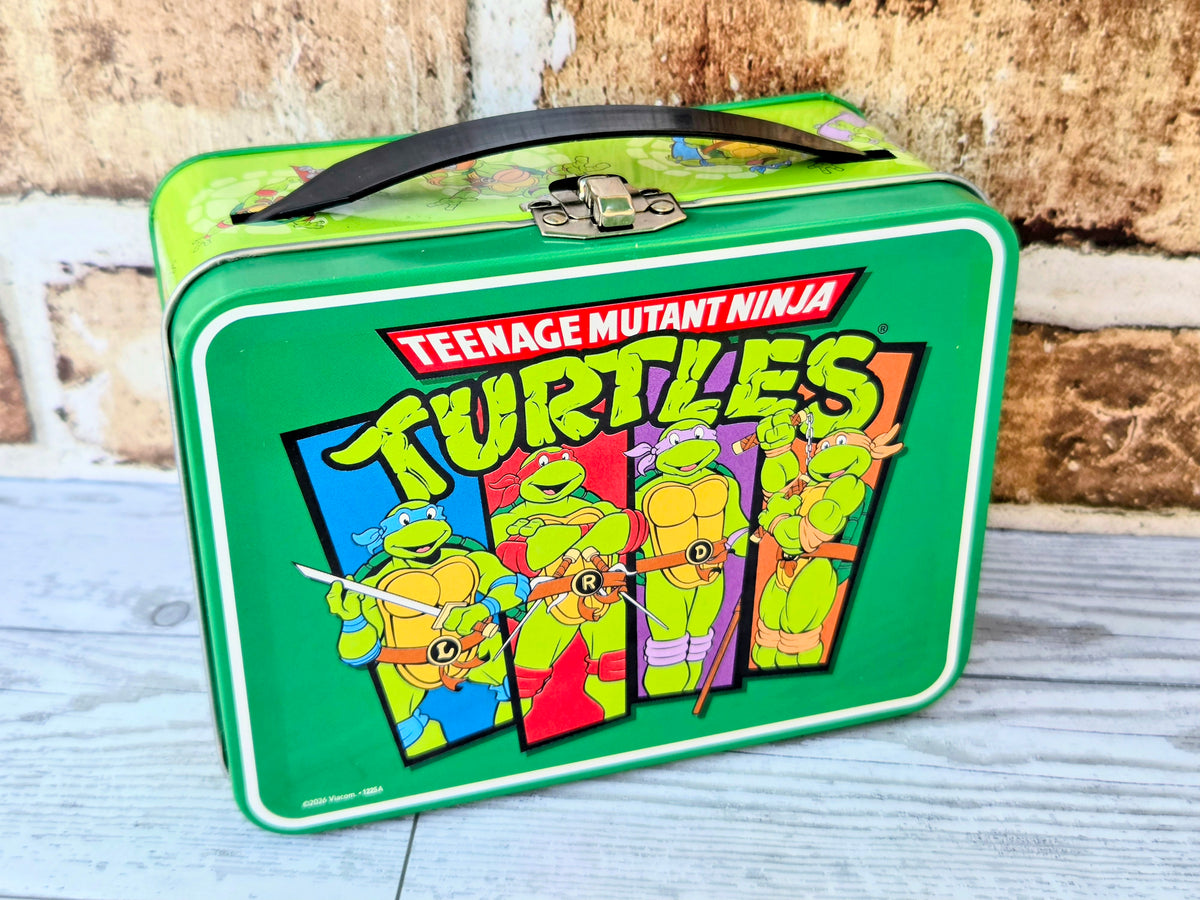 Green Teenage Mutant Ninja Turtles storage tin with latch and graphic front