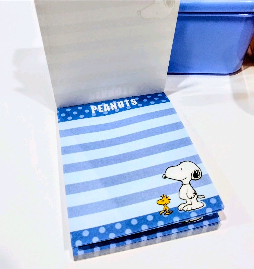 Peanuts Snoopy memo pad with blue-and-white striped cover and character art