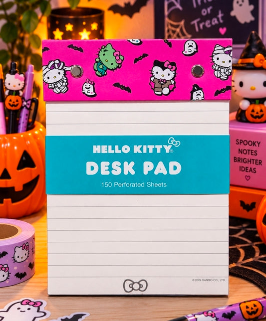 Hello Kitty Halloween desk pad front, hot pink top with teal "DESK PAD" label, 150 sheets