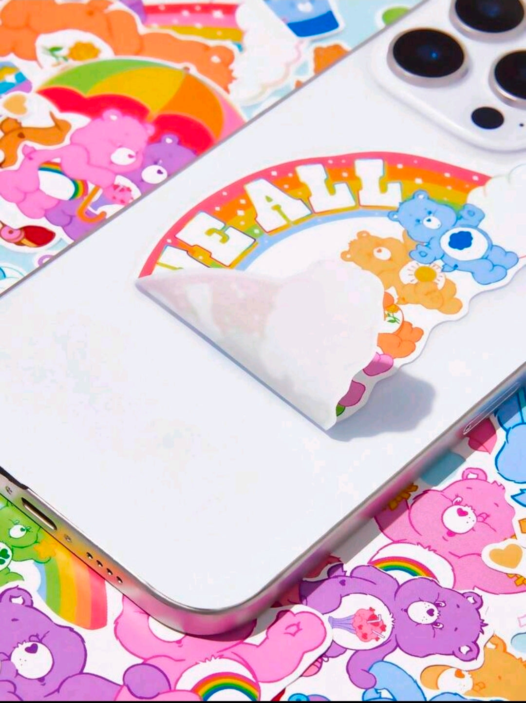 Vinyl decal sticker sheet with cartoon bears and rainbow arc designs