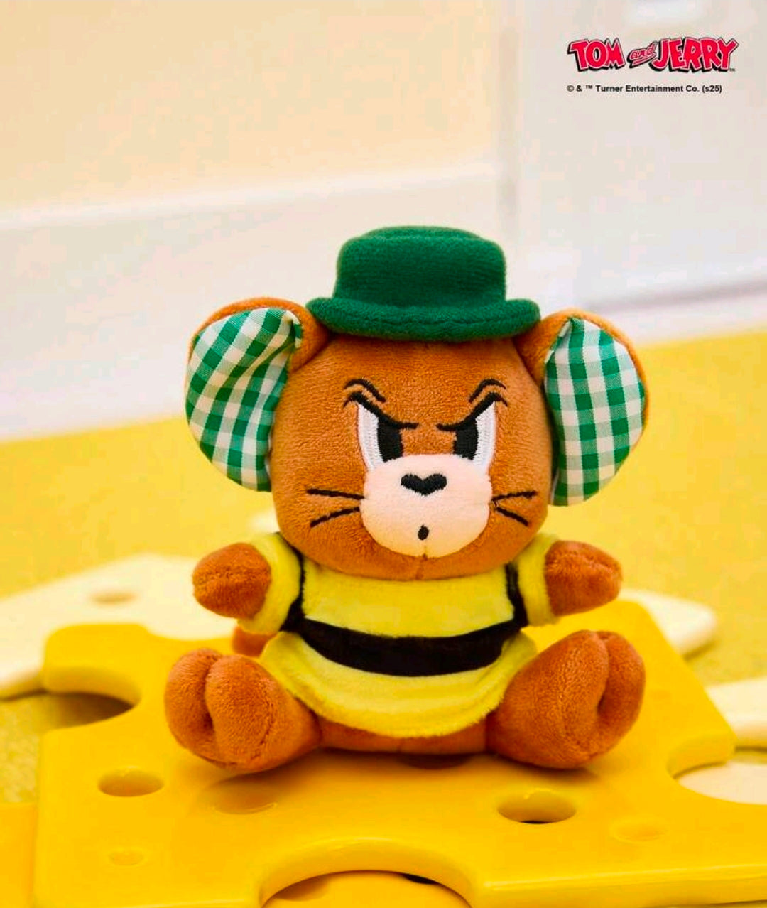 Tom & Jerry mouse mini plush keychain front view with green hat and yellow shirt